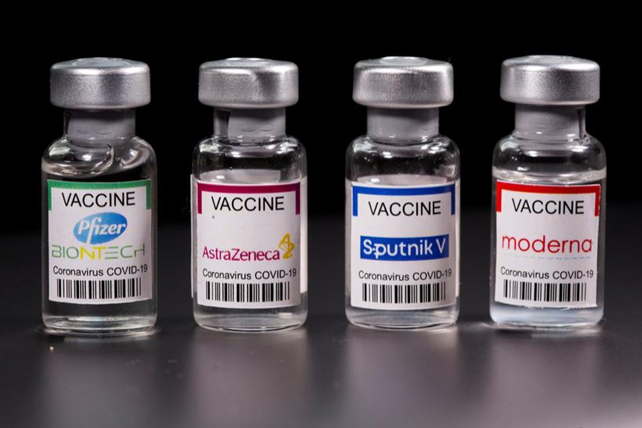 Vials with Pfizer-BioNTech, AstraZeneca, Sputnik V, and Moderna coronavirus disease (Covid-19) vaccine labels are seen in this illustration picture taken on March 19, 2021 — Reuters/Files