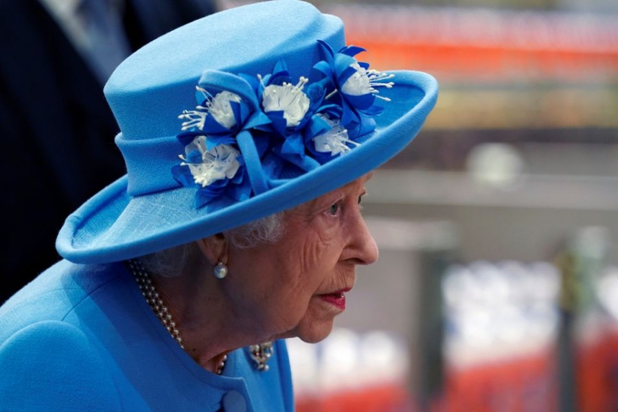 Britain's Queen Elizabeth and Prince William, Duke of Cambridge, known as the Earl of Strathearn in Scotland, (not pictured) arrive for a visit to AG Barr's factory, where the Irn-Bru drink is manufactured, as part of her traditional trip to Scotland for Holyrood Week, in Cumbernauld, Scotland, Britain June 28, 2021. Andrew Milligan/Pool via REUTERS