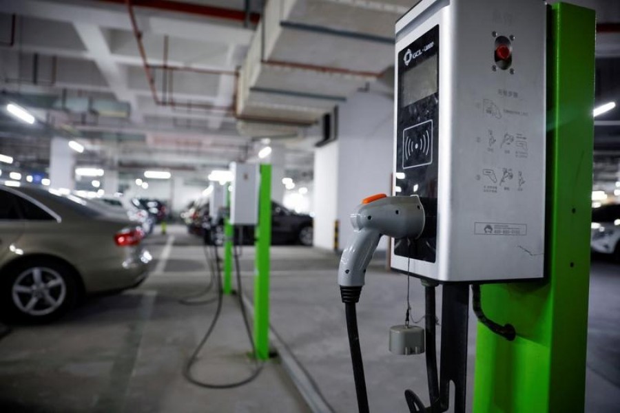 A electric car charging station is pictured in a parking lot in Shanghai, China on March 13, 2021 — Reuters files