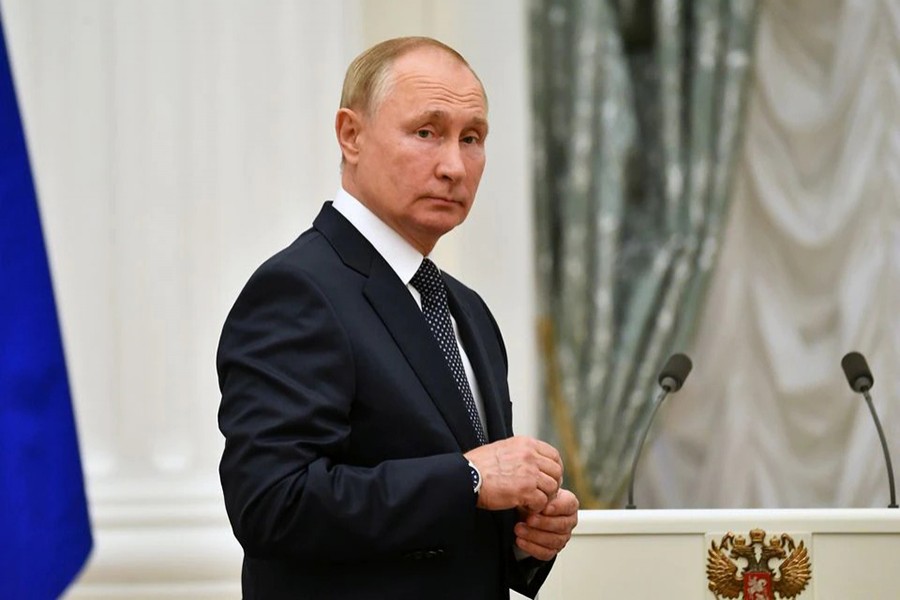 Russian President Vladimir Putin looks on during a meeting with athletes, participants of the 2020 Tokyo Olympic Games, in Moscow, Russia on September 11, 2021 — Kremlin via REUTERS