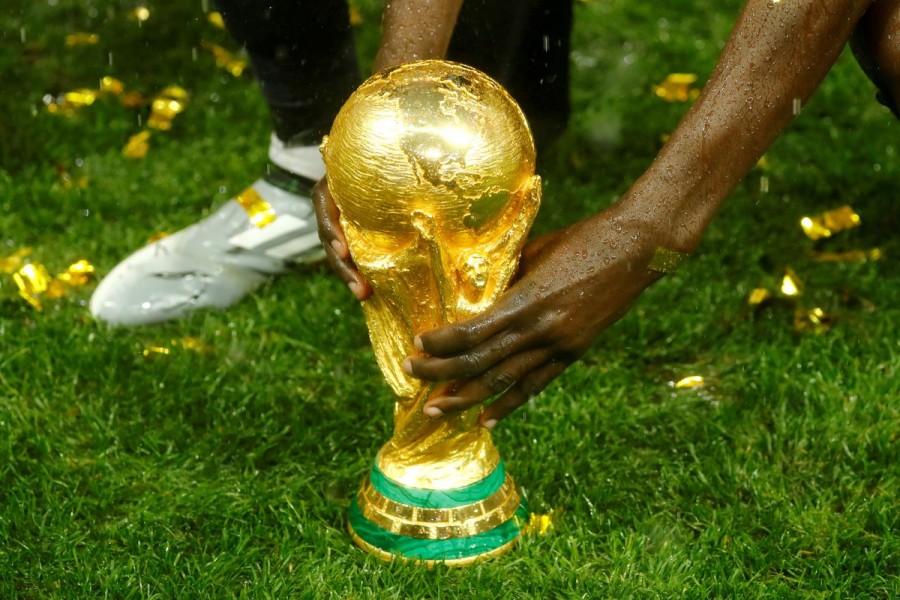 Soccer Football - World Cup - Final - France v Croatia - Luzhniki Stadium, Moscow, Russia - July 15, 2018 General view of the trophy as France celebrate after winning the World Cup REUTERS/Kai Pfaffenbach/File Photo