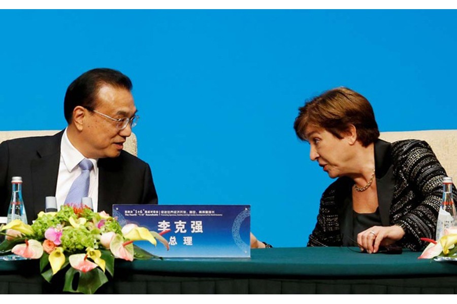 International Monetary Fund (IMF) Managing Director Kristalina Georgieva talks to Chinese Premier Li Keqiang before a news conference following the "1+6" Roundtable meeting at the Diaoyutai state guesthouse in Beijing, China Nov 21, 2019. REUTERS/Florence Lo