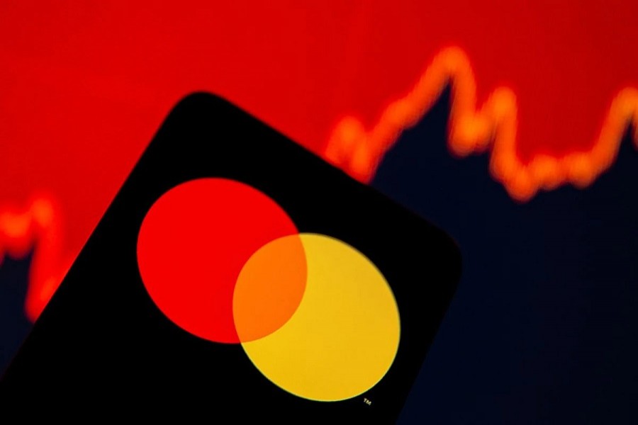 Smartphone with Mastercard logo is seen in front of displayed stock graph in this illustration taken, July 15, 2021— Reuters/Dado Ruvic/Illustration/File Photo