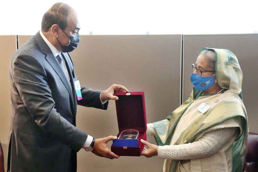 Kuwaiti Prime Minister Sheikh Sabah Khaled Al-Hamad Al-Sabah receiving a souvenir on Mujib Year from Prime Minister Sheikh Hasina during a bilateral meeting at the United Nations Headquarters in New York on Tuesday –PID Photo