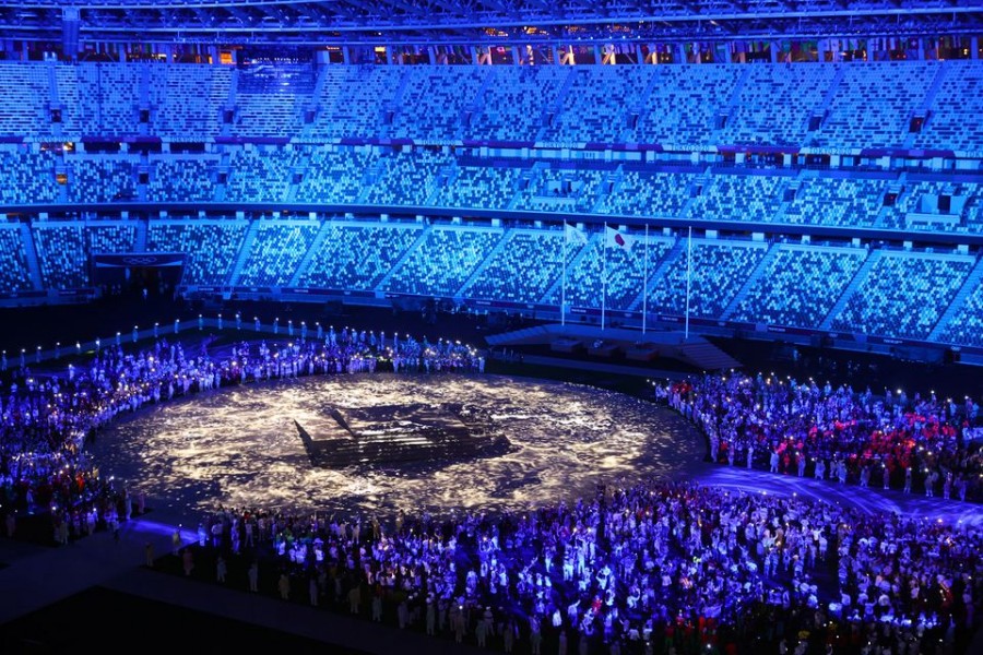 Olympic Stadium in Tokyo is lighted up as athletes take part in the athletes' parade during the closing ceremony of 2020 Olympics — Reuters/Files