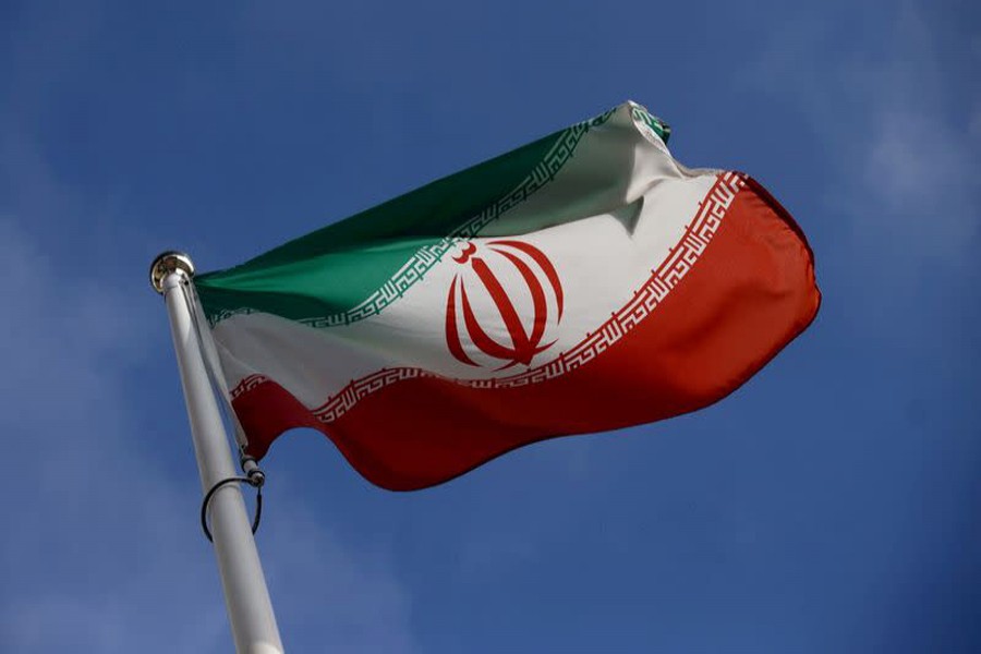 The Iranian flag waves in front of the International Atomic Energy Agency (IAEA) headquarters, before the beginning of a board of governors meeting, in Vienna, Austria, March 1, 2021 --Reuters/Lisi Niesner