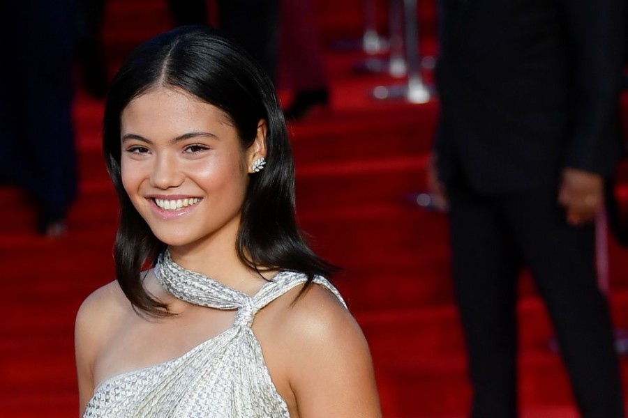 British tennis player Emma Raducanu poses during the world premiere of the new James Bond film "No Time To Die" at the Royal Albert Hall in London, Britain, September 28, 2021. REUTERS/Toby Melville