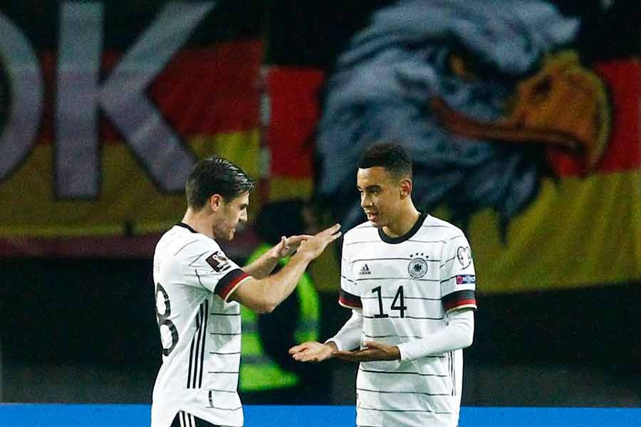 Germany's Jamal Musiala celebrates scoring their fourth goal with Jonas Hofmann during UEFA Qualifier against North Macedonia on Monday –Reuters photo