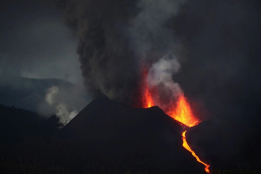 The Cumbre Vieja volcano spews lava and smoke as it continues to erupt on the Canary Island of La Palma, as seen from Tacande, Spain on October 12, 2021 — Reuters photo