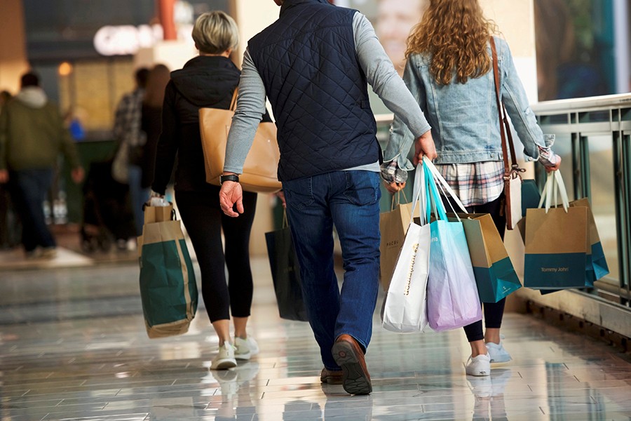 Shoppers carry bags of purchased merchandise at the King of Prussia Mall, United States' largest retail shopping space, in King of Prussia, Pennsylvania, US on December 8, 2018 — Reuters/Files