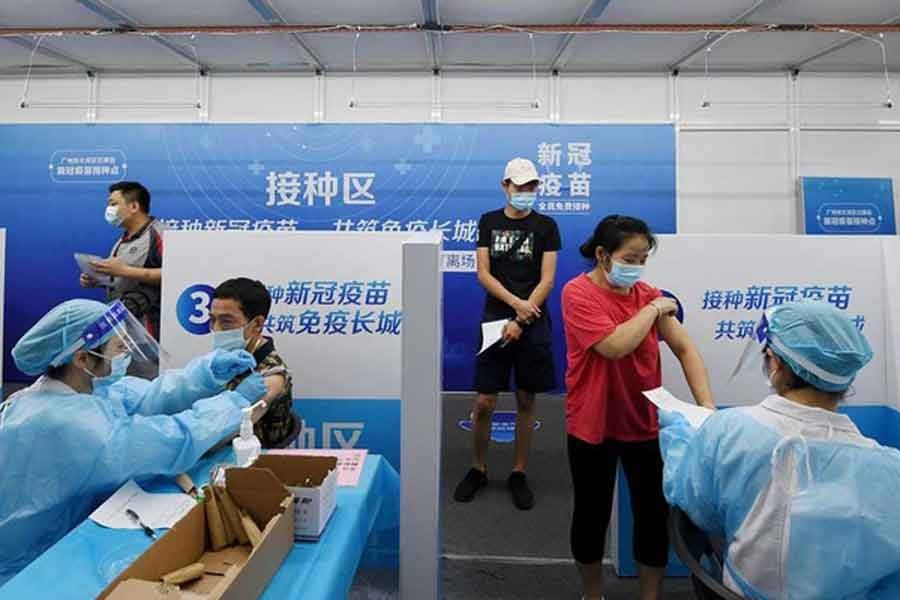 Over 76pc people in China receive complete COVID-19 vaccine doses