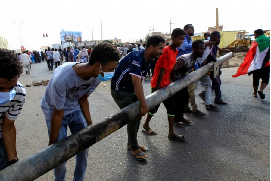 -- On Sunday morning, protesters were back on the streets, again using rocks and tyres to block roads [Mohamed Nureldin/Reuters]