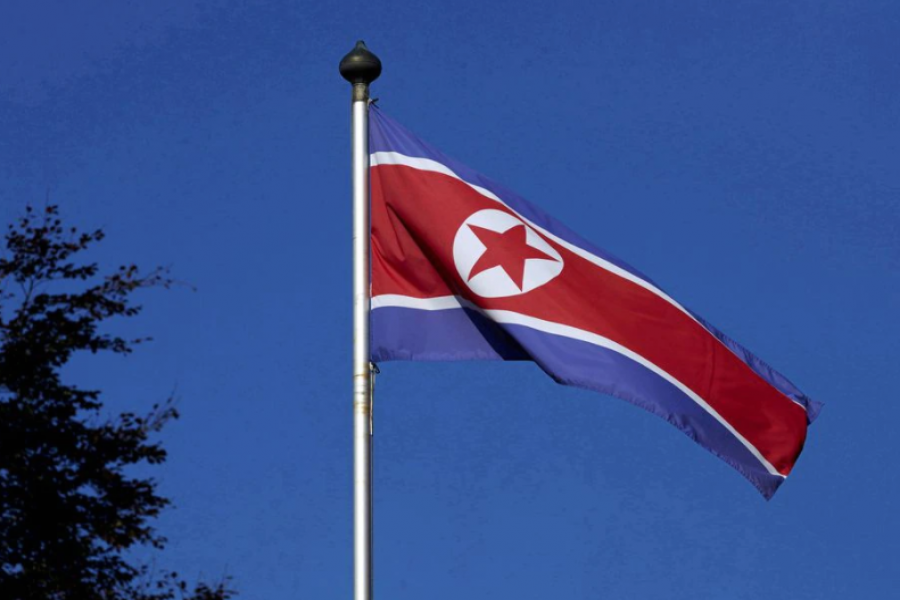 A North Korean flag flies on a mast at the Permanent Mission of North Korea in Geneva October 2, 2014. REUTERS/Denis Balibouse/File Photo