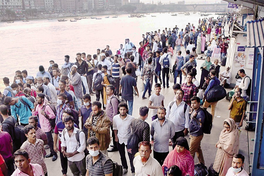 People wait in vain for launches at the Sadarghat terminal in Dhaka as owners of the water vessels suspended their services across the country from Saturday, just a day after the road transport associations had started an indefinite strike on Friday following a hike in diesel and kerosene prices — FE photo