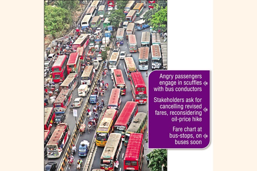 Public transports resumed in full swing on Monday after a three-day strike, although passengers and transporters of those vehicles frequently locked horns over the government-fixed hiked fares. The photo was taken from Gulistan-Paltan road in the capital on Monday — FE Photo by KAZ Sumon