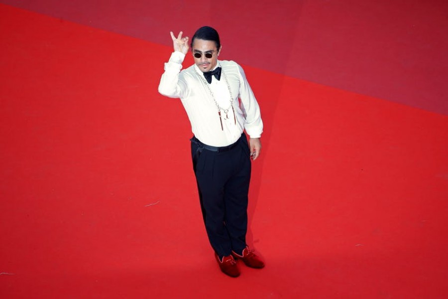 Nusret Gokce, known as Salt Bae, poses at the 72nd Cannes Film Festival. Screening of the "The Traitor"(Il traditore) in competition - Red Carpet Arrivals - Cannes, France, May 23, 2019. Nusret Gokce known as Salt Bae poses. REUTERS/Regis Duvignau