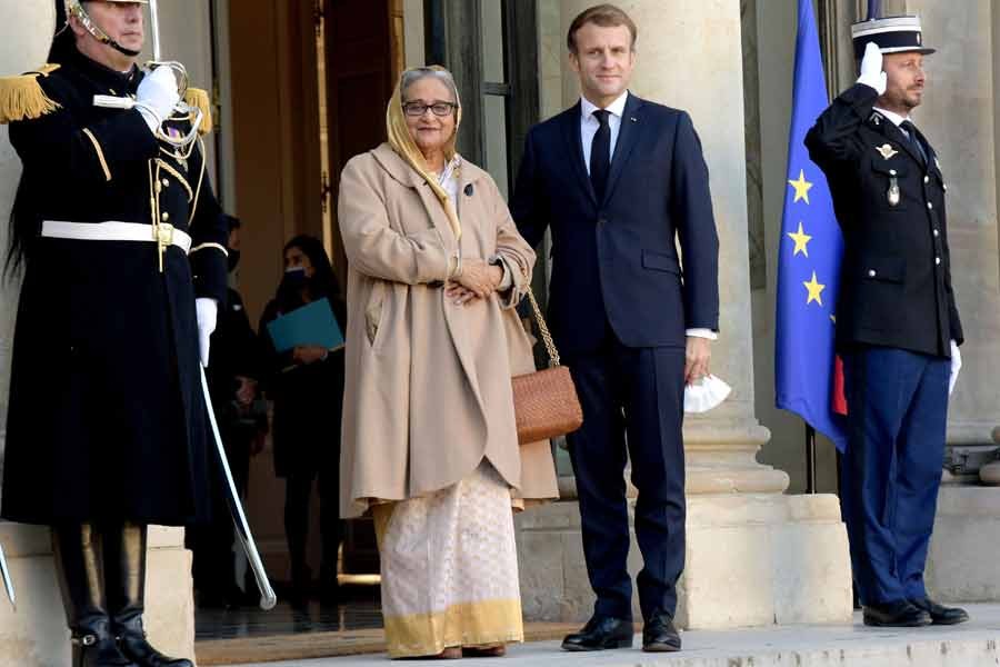 French President Emmanuel Macron receiving Prime Minister Sheikh Hasina at the Elysee Palace, the official residence of the French president, on Tuesday –PID photo