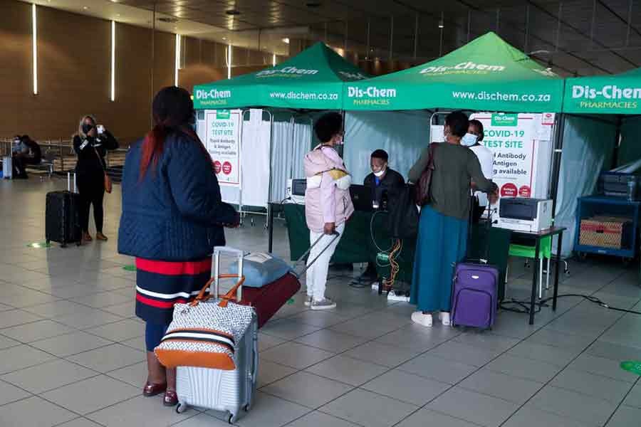 Passengers waiting in queue to get a PCR test against the coronavirus disease (COVID-19) before travelling on international flights at OR Tambo International Airport in Johannesburg of South Africa on Saturday –Reuters photo