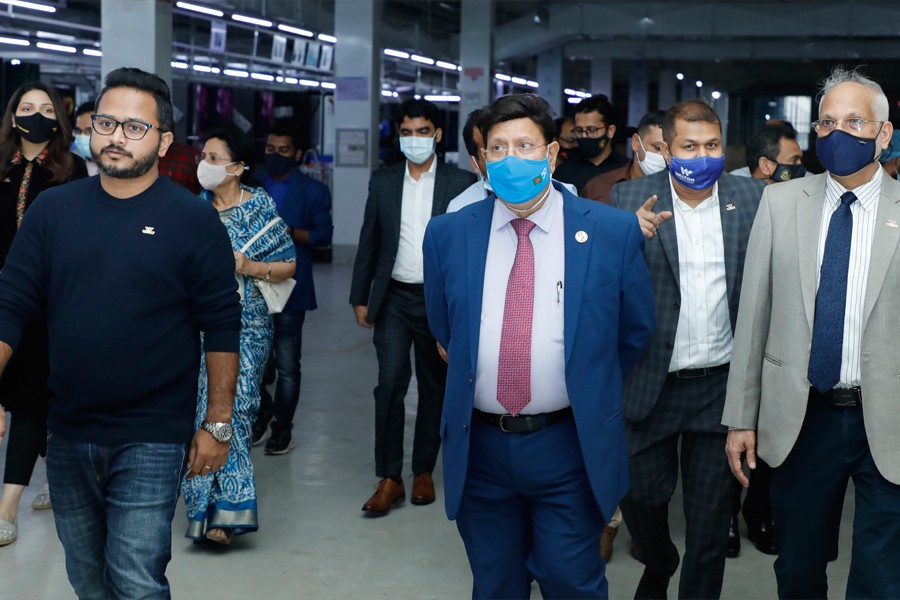 - Foreign Minister Dr AK Abdul Momen, WHIL's Vice-Chairman S M Shamsul Alam, MD and CEO Golam Murshed and Director Sabiha Jarin Orona during the visit at Walton factory