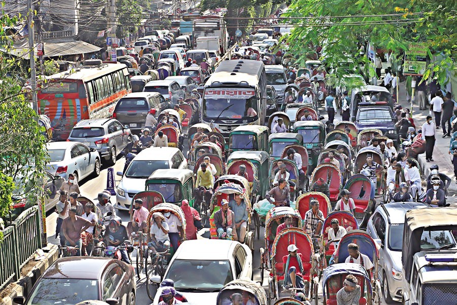 Dhaka city experienced severe gridlocks at different points on Thursday. The photo was taken from the road in front of Motijheel Govt Boys' High School in the capital — FE photo