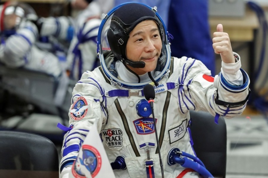 Japanese billionaire Maezawa blasts off to International Space Station