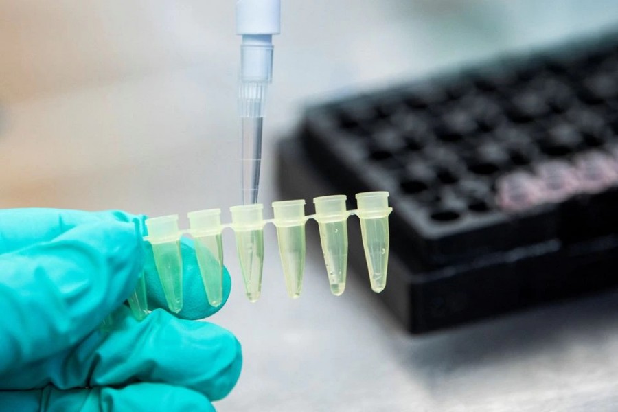 Molecular biology tech, Sarah Corcoran, prepares SARS-CoV-2 samples as part of the RNA sequencing process at Ohio State University in Columbus, where the Omicron variant of coronavirus was recently identified in several samples from Ohio, in Columbus, Ohio, US on December 13, 2021 — Reuters/Files