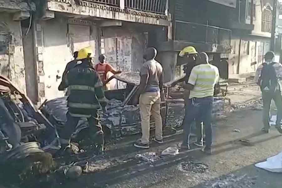 People standing at the site of an explosion in Cap-Haitien in Haiti on Tuesday –Reuters photo