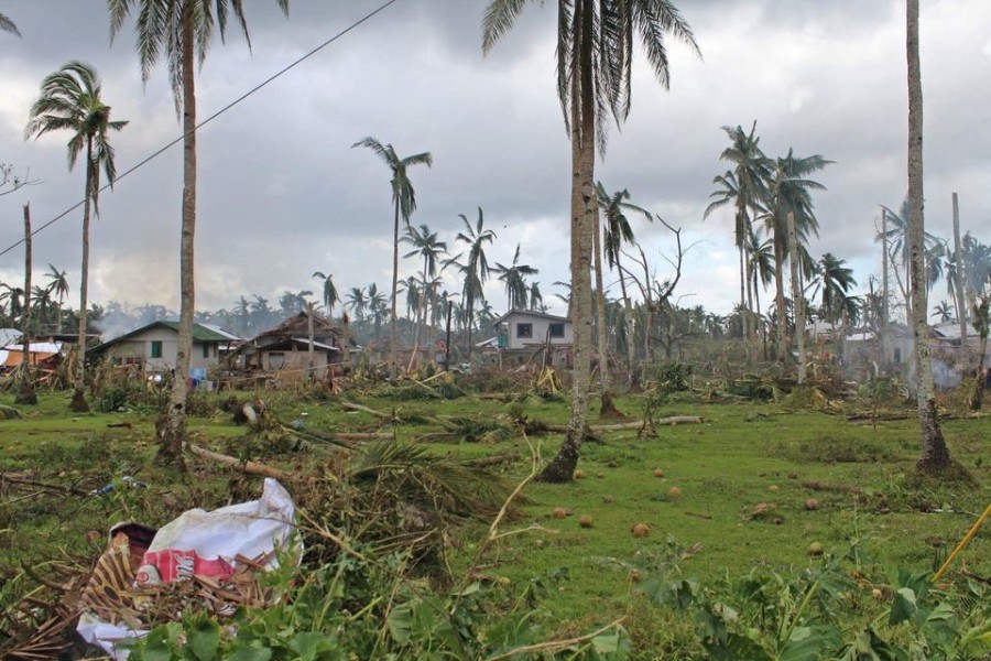 Houses and trees damaged by typhoon Rai are seen, in Surigao del Norte province, Philippines on December 18, 2021 — Philippine Coast Guard/Handout via REUTERS