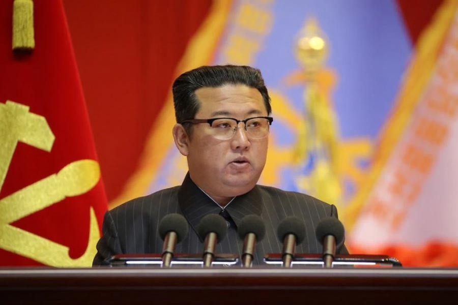 North Korean leader Kim Jong Un speaks during the Eighth Conference of Military Educationists of the Korean People's Army at the April 25 House of Culture in Pyongyang, North Korea in this undated photo released on December 7, 2021. KCNA via REUTERS/File Photo