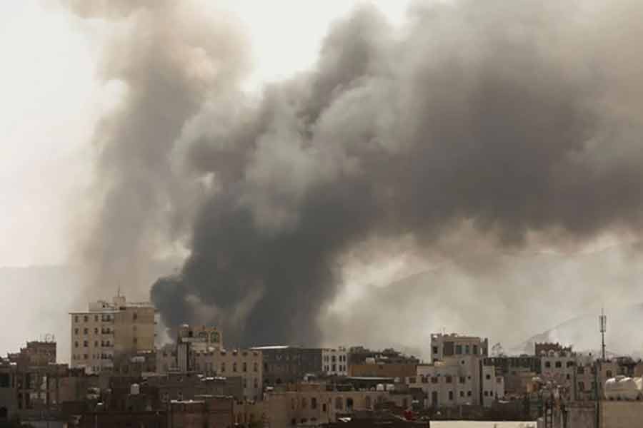 Smoke billowing from the site of Saudi-led airstrikes in Sanaa of Yemen on March 7 in 2021 -Reuters file photo