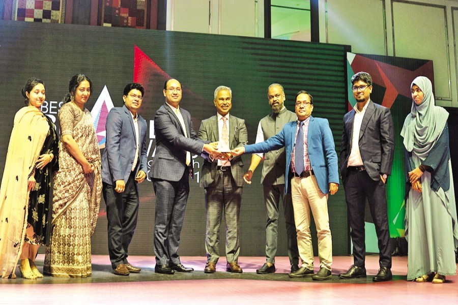 S M Didarul Hasan, Deputy General Manager of Marketing, Ispahani Tea Limited, along with other officials receiving the Best Tea Brand Award on behalf of the Ispahani Group at the award ceremony at a city hotel on Wednesday