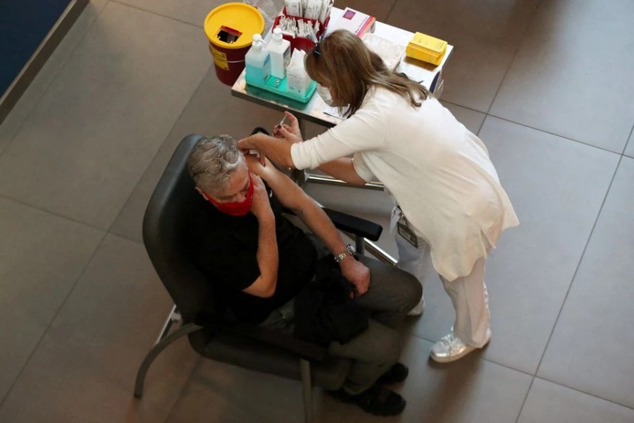 A medical worker vaccinates a man against the coronavirus disease (Covid-19) as Israel kicks off a coronavirus vaccination drive, at Tel Aviv Sourasky Medical Center (Ichilov Hospital) in Tel Aviv, Israel on December 20, 2020 — Reuters/Files