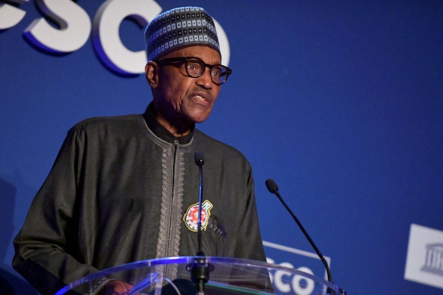 Nigeria's President Muhammadu Buhari speaks during the 75th anniversary celebrations of the United Nations Educational, Scientific and Cultural Organization (UNESCO) at UNESCO headquarters in Paris, France, November 12, 2021. Julien de Rosa/ Pool via REUTERS/File