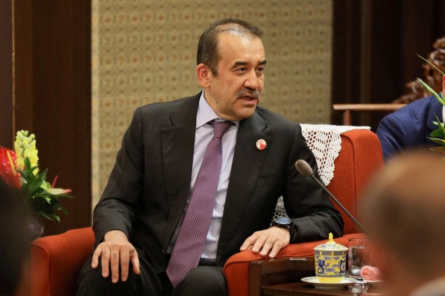 FILE PHOTO: Karim Massimov, chairman of the National Security Council of Kazakhstan meets with Chinese Vice President Wang Qishan at Zhongnanhai in Beijing, China April 8, 2019. Kenzaburo Fukuhara/Pool via REUTERS/File Photo