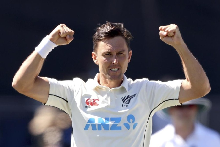 Trent Boult of New Zealand reacts during play on day two of the second cricket test between Bangladesh and New Zealand at Hagley Oval in Christchurch, New Zealand, Monday, Jan. 10, 2022. (Martin Hunter/Photosport via AP)