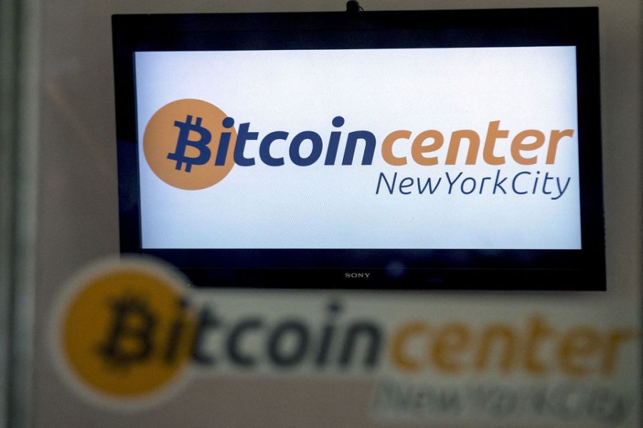 A Bitcoin logo is displayed on a screen inside the Bitcoin Center New York City in New York's financial district July 28, 2015. REUTERS/Brendan McDermid