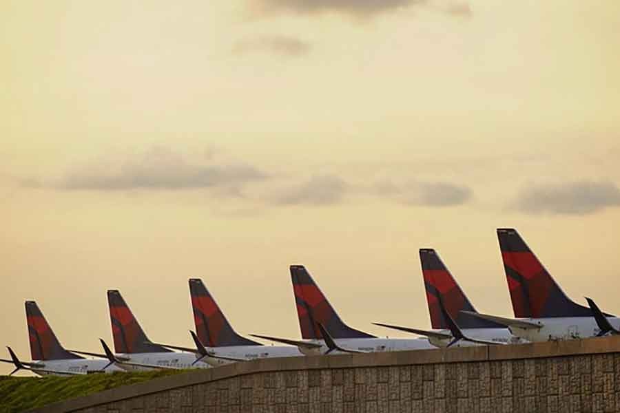 Delta Air Lines 737 passenger planes are seen lined up on a runway where they are parked, due to flight reductions made to slow the spread of coronavirus disease (COVID-19), at Atlanta Hartsfield-Jackson International Airport in Atlanta of Georgia in the US on March 21 in 2020 -Reuters file photo