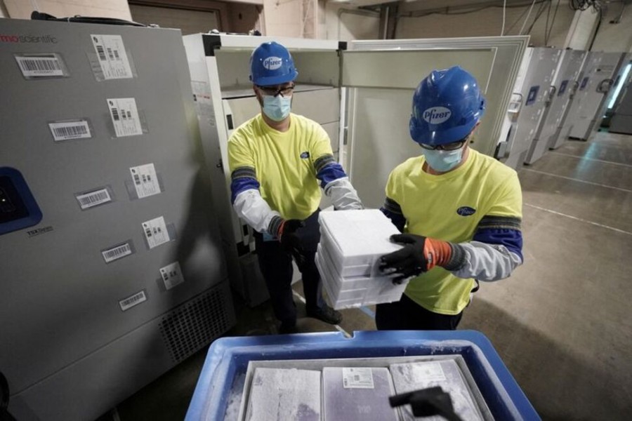 Boxes containing the Pfizer-BioNTech COVID-19 vaccine are prepared to be shipped at the Pfizer Global Supply Kalamazoo manufacturing plant in Portage, Michigan, US, December 13, 2020 – Morry Gash/Pool via Reuters