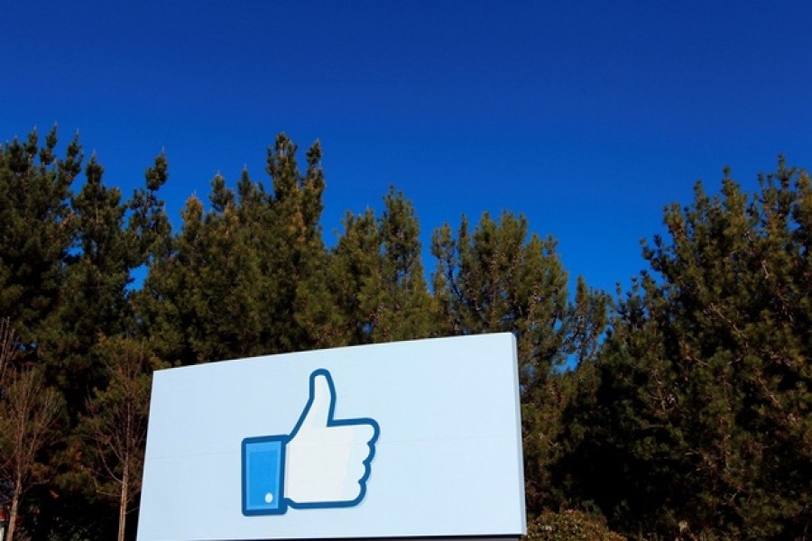 A giant "like" icon made popular by Facebook is seen at the company's new headquarters in Menlo Park, California January 11, 2012 – Reuters/Files