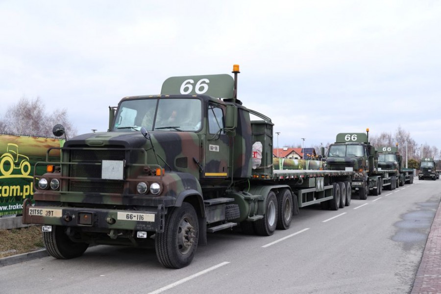 US Military vehicles are parked outside the G2A Arena near the Rzeszow-Jasionka Airport, Poland February 6, 2022. REUTERS/Kuba StezyckiU.S. Military vehicles are parked outside the G2A Arena near the Rzeszow-Jasionka Airport, Poland February 6, 2022. REUTERS/Kuba Stezycki