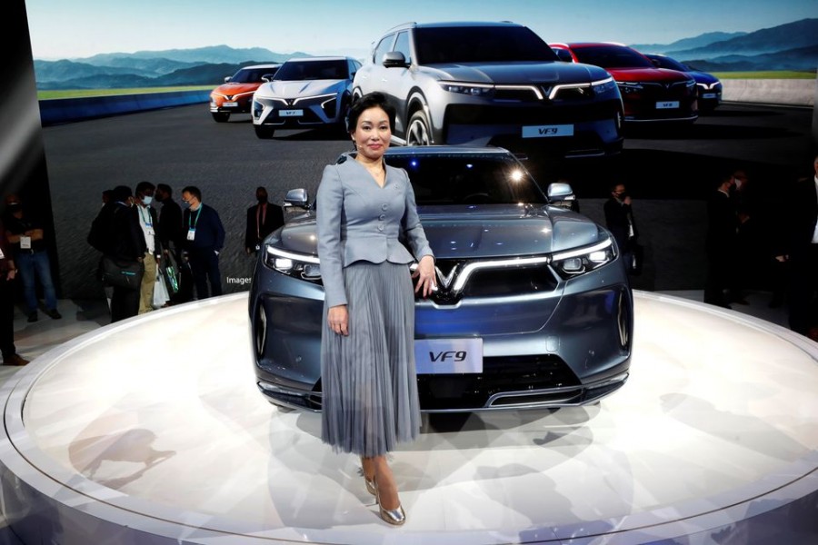 Le Thi Thu Thuy, vice chairwoman of the Vingroup and VinFast Global CEO, poses by a VF9 electric SUV during the unveiling of a line of electric SUVs at CES 2022 at the Las Vegas Convention Center in Las Vegas, Nevada, US January 5, 2022. REUTERS/Steve Marcus