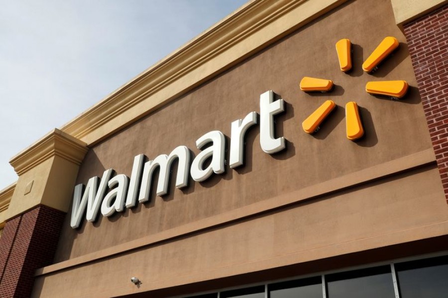 A Walmart sign is seen inside its department store in West Haven, Connecticut, US, February 17, 2021. REUTERS/Mike Segar