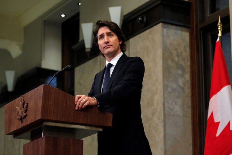 Canada’s Prime Minister Justin Trudeau listens to a question from a reporter at a news conference as truckers and their supporters continue to protest against coronavirus disease (COVID-19) vaccine mandates, in Ottawa, Ontario, Canada, February 11, 2022 – Reuters