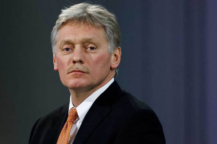 Kremlin spokesman Dmitry Peskov attends an annual end-of-year news conference of Russian President Vladimir Putin, in Moscow, Russia, December 23, 2021. REUTERS/Evgenia Novozhenina