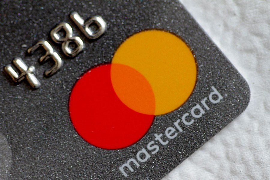 A Mastercard logo is seen on a credit card in this picture illustration - Reuters