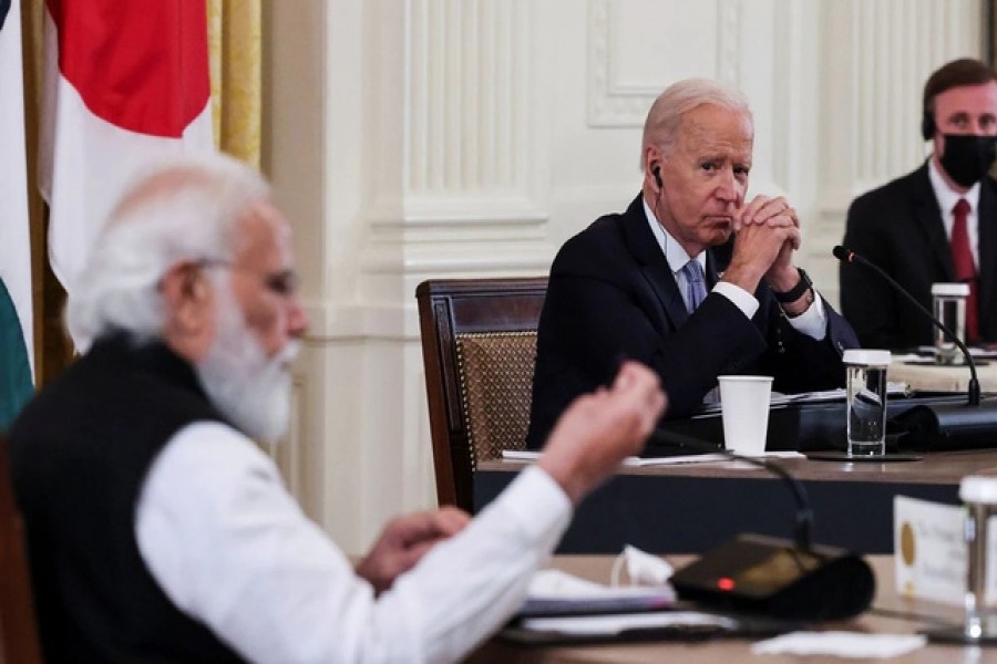 US President Joe Biden listens as India's Prime Minister Narendra Modi speaks during a 'Quad nations' meeting at the Leaders' Summit of the Quadrilateral Framework held in the East Room at the White House in Washington, US, Sept 24, 2021 — Reuters