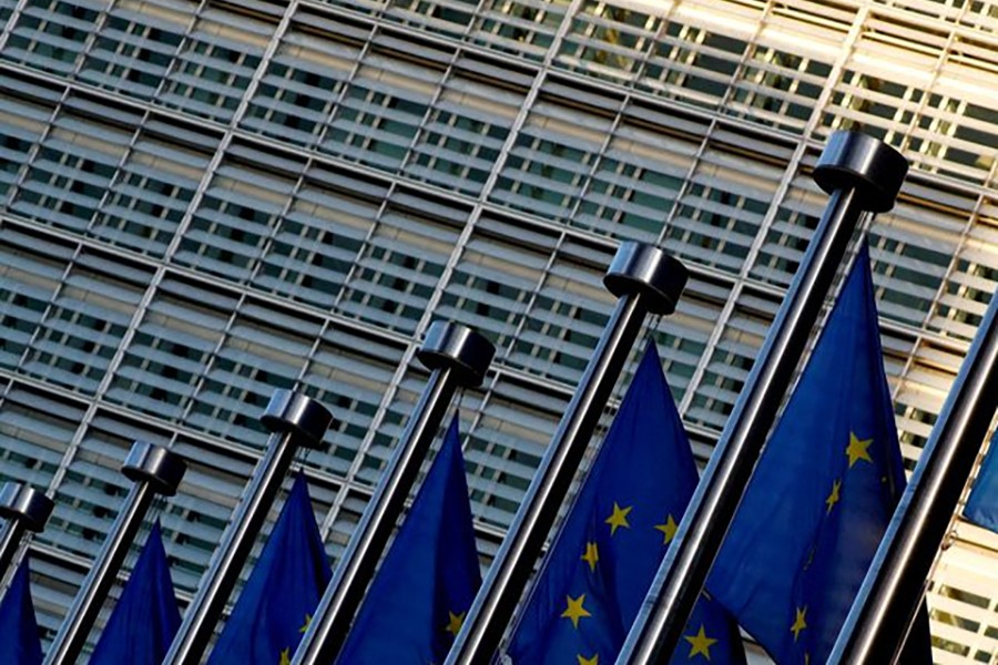 European Union flags are seen outside the European Commission headquarters in Brussels, Belgium on November 14, 2018 — Reuters/Files