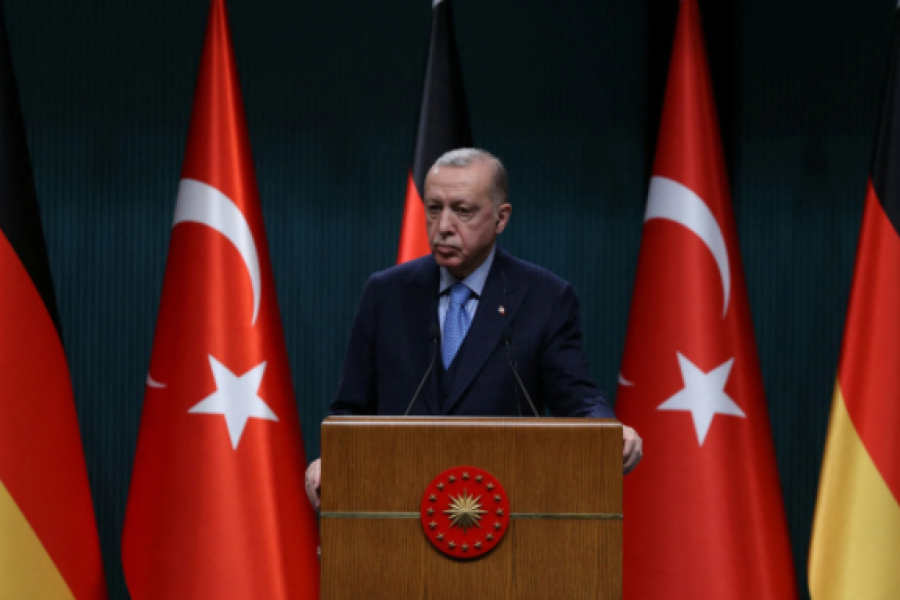 Turkish President Tayyip Erdogan speaks during a press conference with German Chancellor Olaf Scholz at the Presidential Palace in Ankara, Turkey March 14, 2022. REUTERS/Stringer