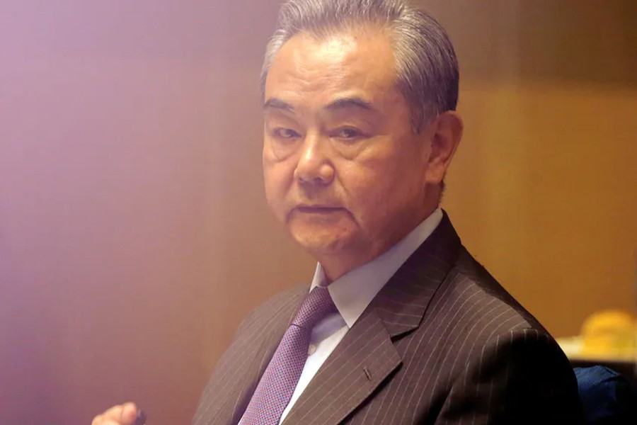 China's Foreign Minister Wang Yi seen in this undated photo — Pool via Reuters