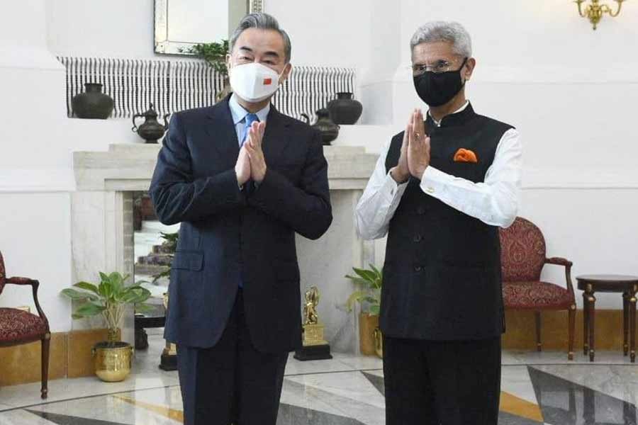 India's Foreign Minister Subrahmanyam Jaishankar and his Chinese counterpart Wang Yi greeting the media before their meeting in New Delhi on Friday –Reuters photo